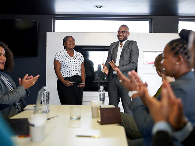 african american business people in office presentation with audience